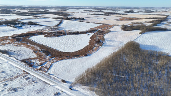 A Private Prairie Holding with Pond, Farmland & Homesite Potential Near Leduc, AB
