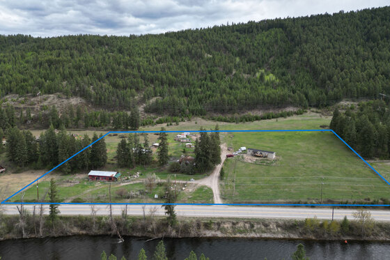 7 Acre Rock Creek Farm with River Views and Two Homes