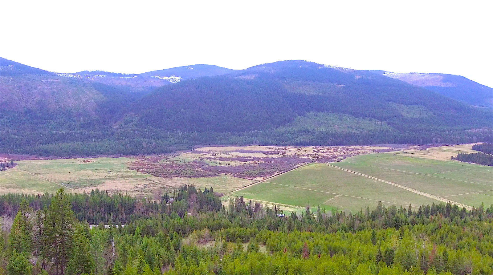 127 Acres of Stunning Wilderness, Views and Partially Completed Home