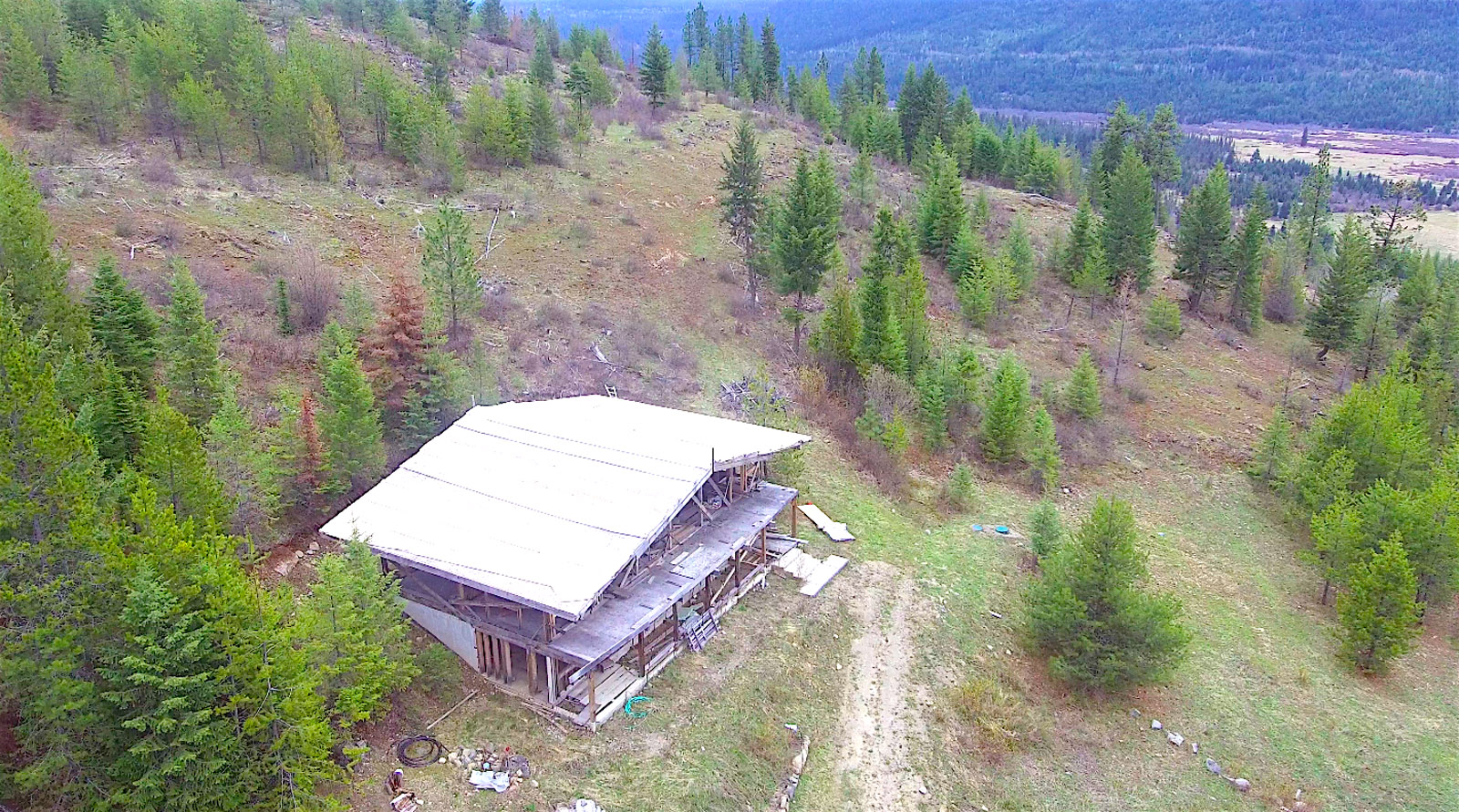 127 Acres of Stunning Wilderness, Views and Partially Completed Home