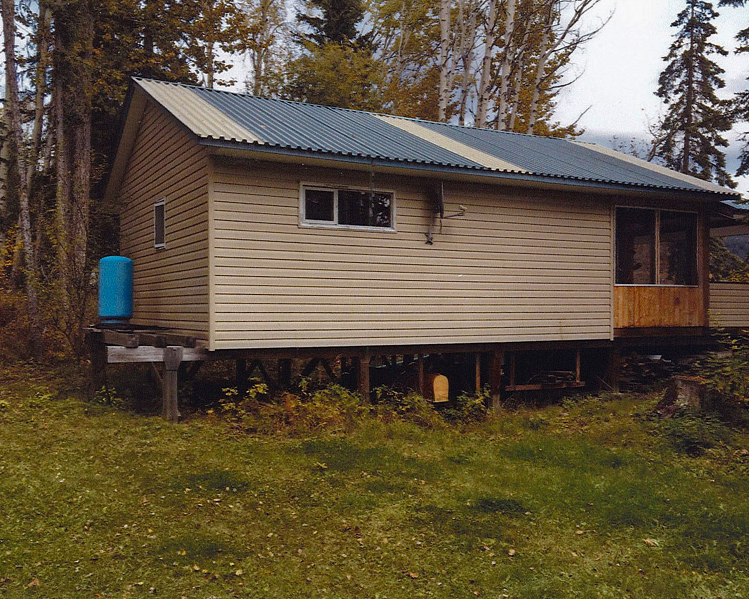 2 Lakefront Cabins on 2 Titles Trembleur Lake, BC LandQuest® Realty