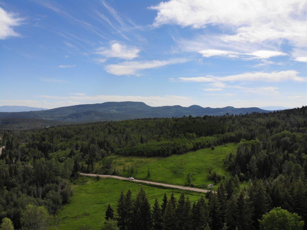 Lush Mountain Oasis Homestead Pinantan Lake, BC LandQuest® Realty