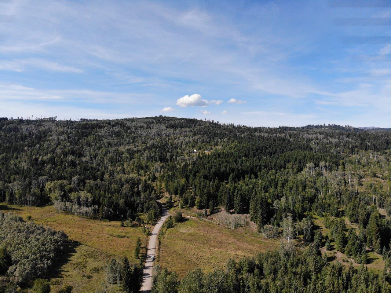 Lush Mountain Oasis Homestead Pinantan Lake, BC LandQuest® Realty