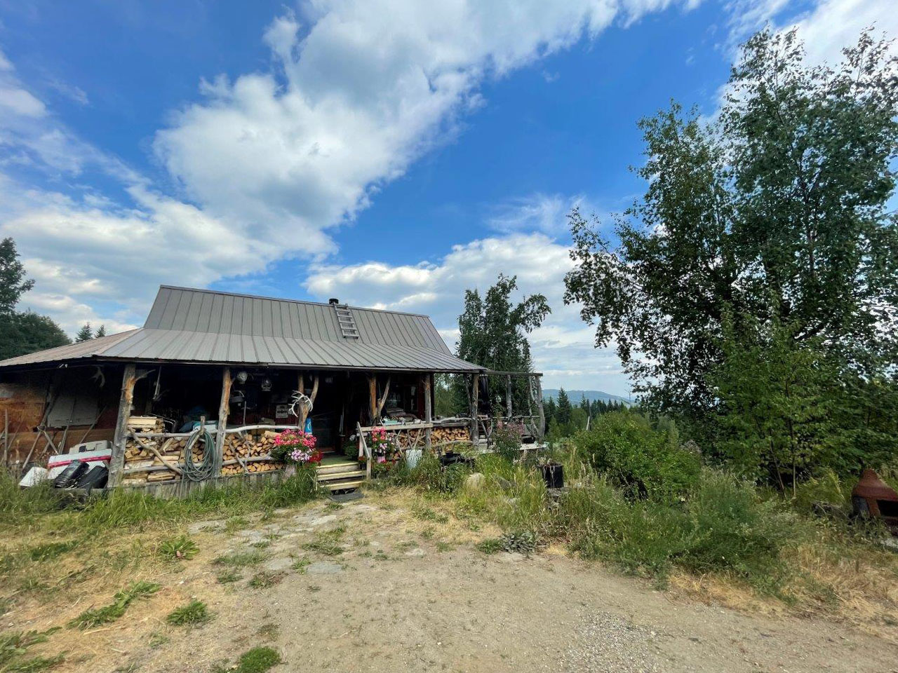 Lush Mountain Oasis Homestead Pinantan Lake, BC LandQuest® Realty