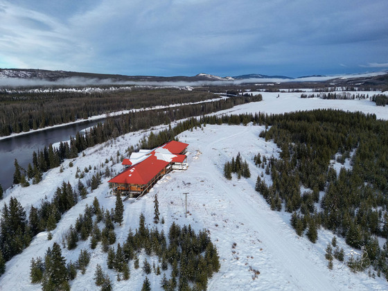 Riverfront Acreage with No Zoning and Large Unfinished Hotel - Vanderhoof, BC